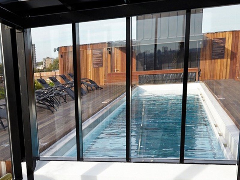 Sidworth Street London rooftop pool through window